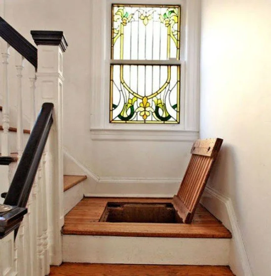 Stair Storage Space; Even Though It May Be Visible It Is Uncomfortable to Search Into + A Simple Rug On Top of It Can Help