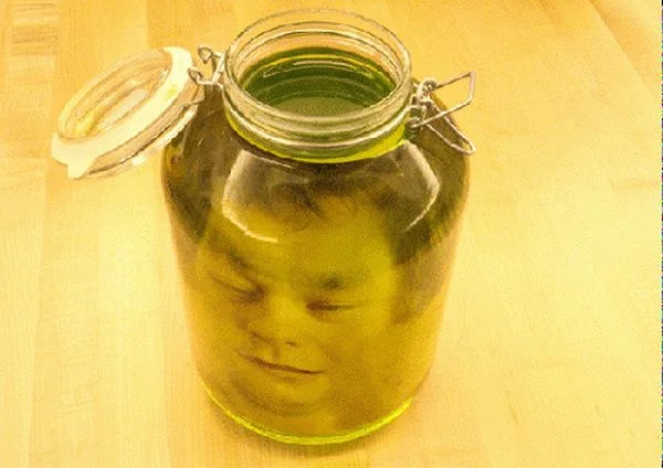 Terrify Your Guests With a Ghoulish Great- The DIY Head in a Jar Halloween Project [Printable Included]