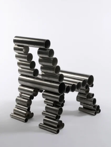 32. Metallic cylinders turned to chair