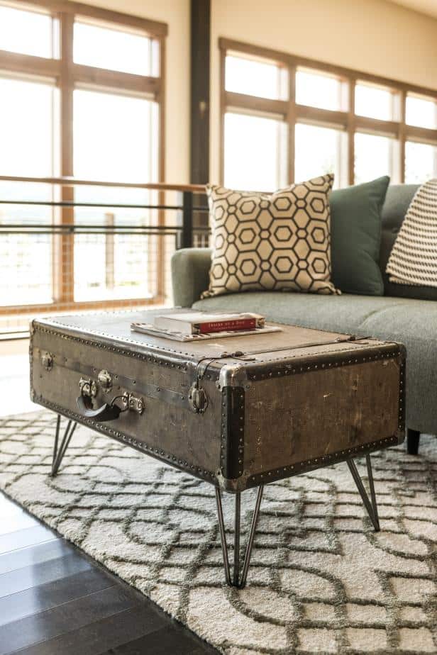 24. A VINTAGE SUITCASE CAN SERVE AS A CHIC COFFEE TABLE