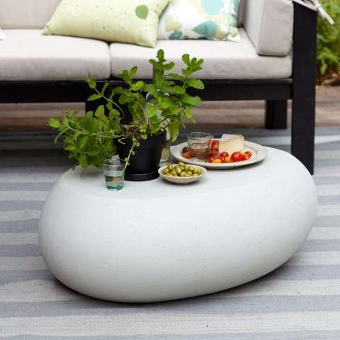26. GO MINIMAL AND OPT FOR A STONE OR CONCRETE BLOCK COFFEE TABLE