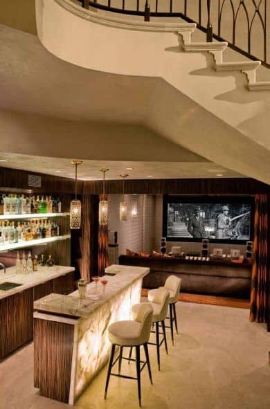 Movie theater and game room with billiards and a wet bar.