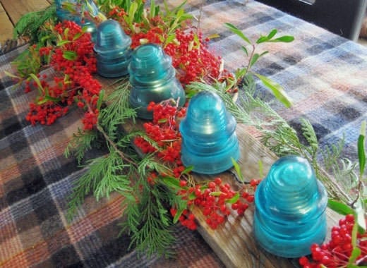 16. unique dinning table centerpiece with glass insulator lights