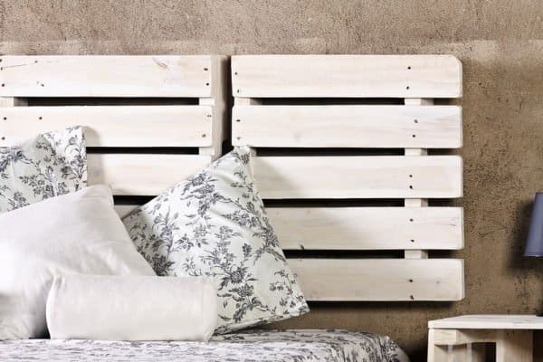 5.  WHITE PALLETS USED AS BED HEADBOARD