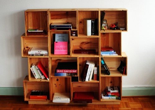 13. A beautiful modular shelving unit can be made from wine boxes