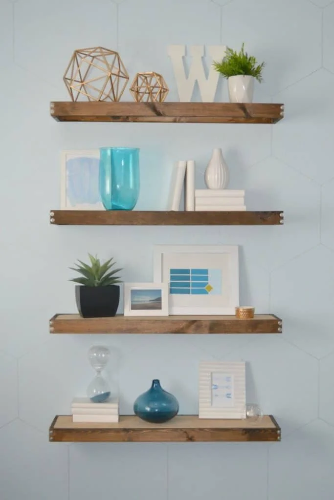 20. Rustic floating shelves make great addition to your decor, even if it is modern