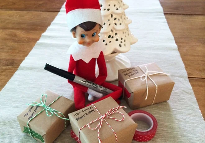 68. Elfie Wrapping Christmas Presents