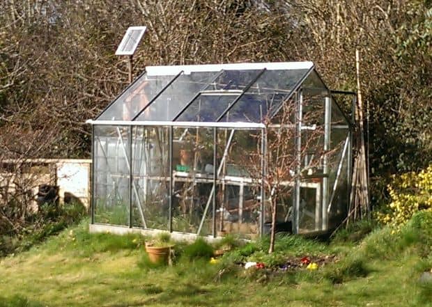 THE GREENHOUSE WITH AN AUTOMATIC SOLAR POWERED WATERING SYSTEM