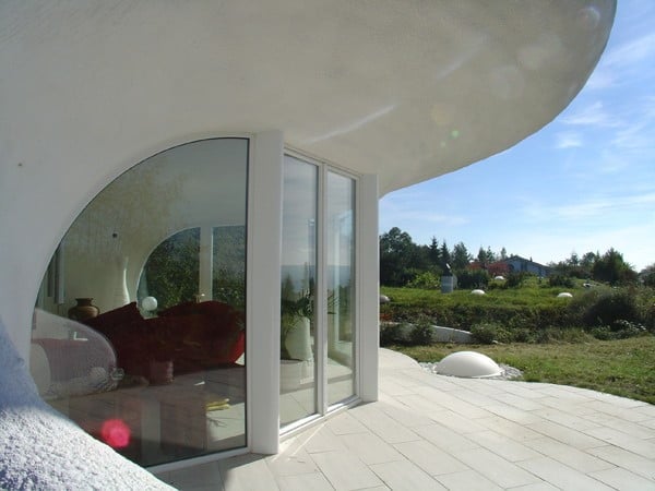 Earth House Estate Lättenstrasse in Dietikon, Switzerland by Vetsch Architektur Homesthetics curved roof