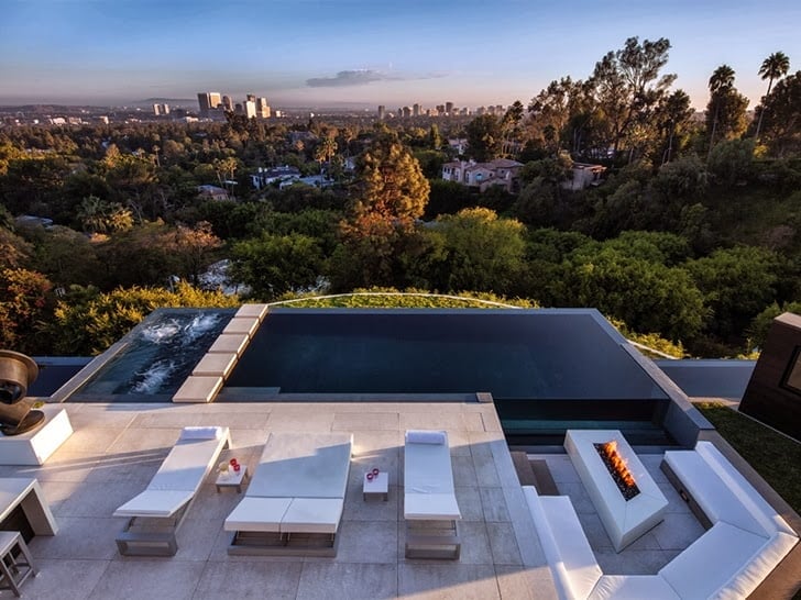 backyard landscaping ideas of the infinity pool of the 1201 Laurel Way-Cliff View Luxurious Modern Mansion in Beverly Hills California