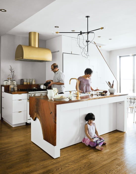 white stak kitchen interior design featuring a place under the counter for various functionalities