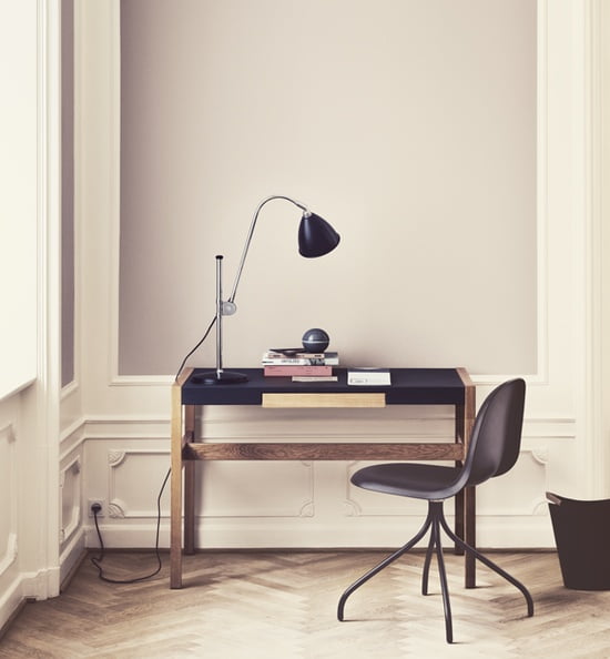 small desk area in the hallway for the phone and notebook