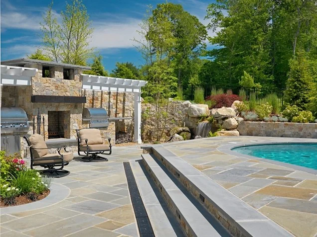 amazing brick fireplace by the pool