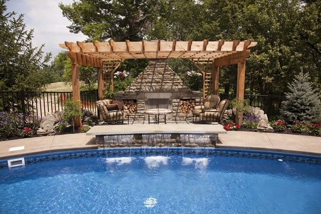 fireplace by the swimming pool Backyard-Lanscaping-Ideas-Fireplaces-homesthetics