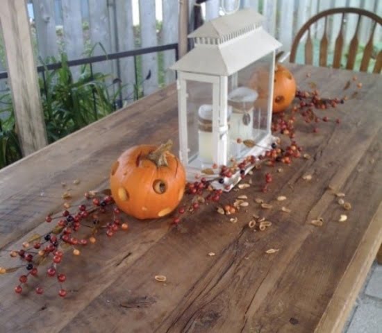 white latern on the patio DIY -Welcome the Fall with Warm and Cozy Patio Decorating Ideas homesthetics (41)