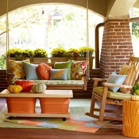 covered patio with warm colors DIY -Welcome the Fall with Warm and Cozy Patio Decorating Ideas homesthetics (41)