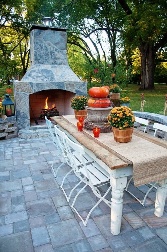 outdoor fireplace DIY -Welcome the Fall with Warm and Cozy Patio Decorating Ideas homesthetics (41)