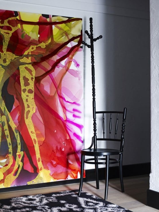 Contemporary Black Interior Design with Vibrant Accents colorful painting