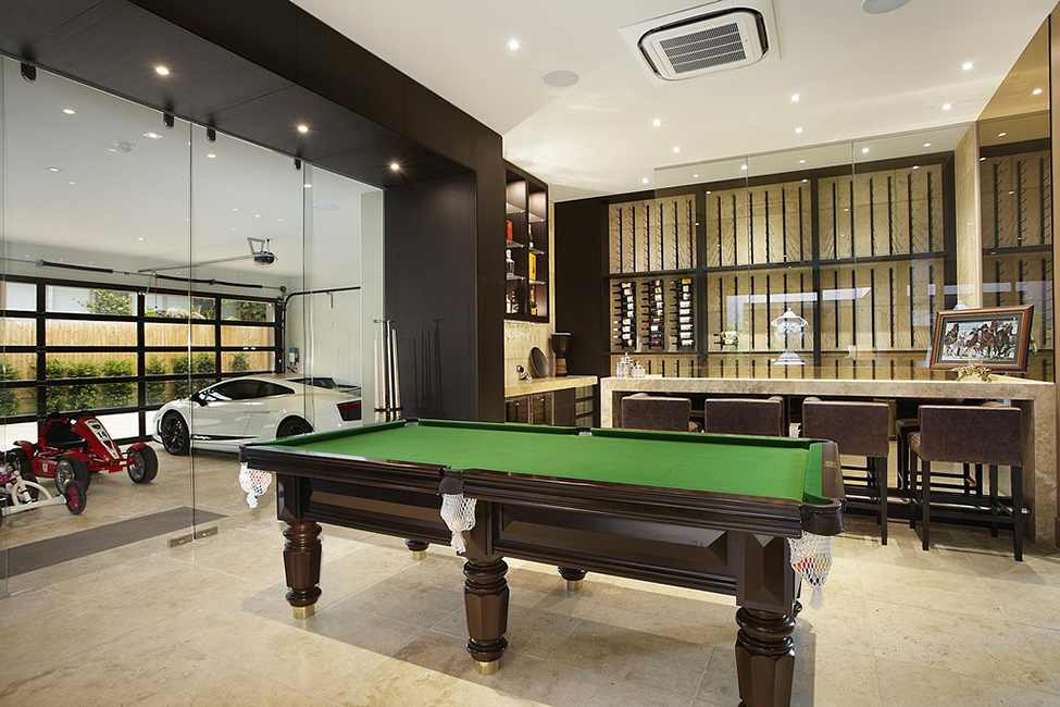 pool table in black and white interior design Large Luxurious Modern Mansion in Melbourne Wearing Contemporary Style 