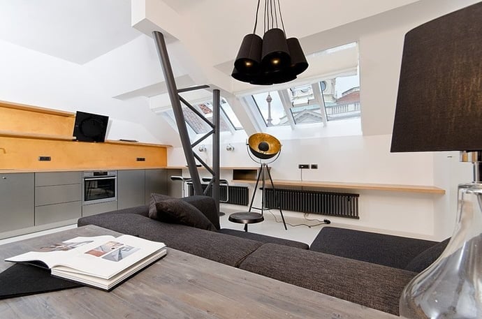 living room in Small Tiny Minimalist Black And White Apartment In Prague by OOOOX