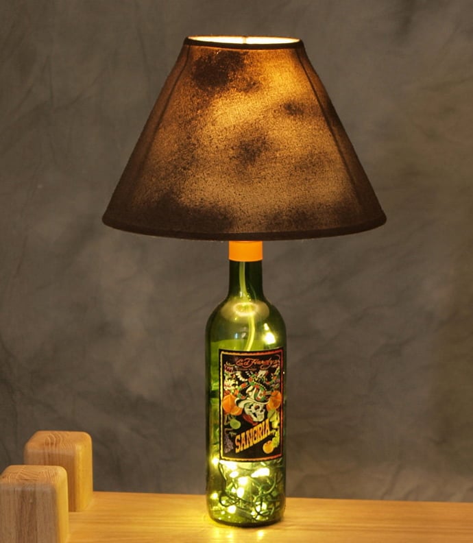 desk lamp made out of a wine bottle art 20 Creative & Inspiring Ideas of How to Recycle Wine Bottles Into Pieces of Art homesthetics (26)