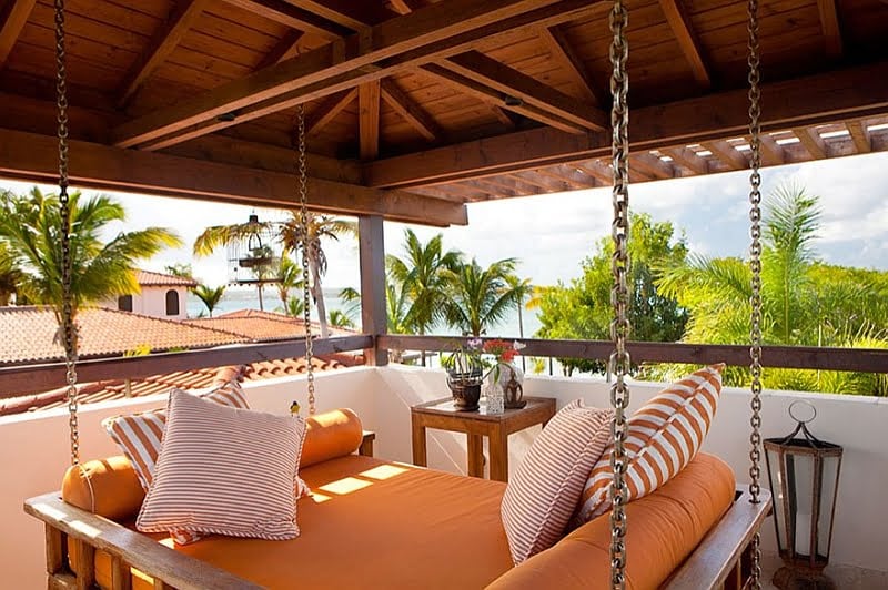 Suspended Outdoor Daybed Enhancing a Tropical Patio
