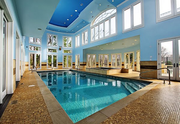 A multitude of windows Offering Light to the Interior Swimming Pool