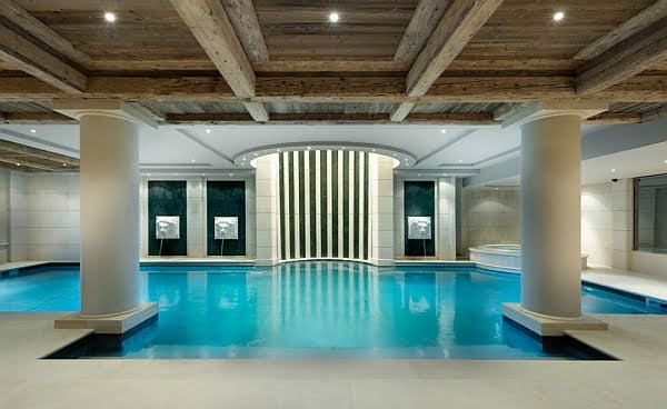 Beatuiful Illuminated Indoor Pool with Wooden Ceilling
