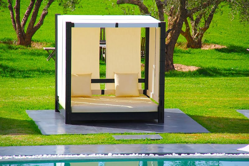 Perfect Cubic Outdoor Bed Complementing the Pool Deck