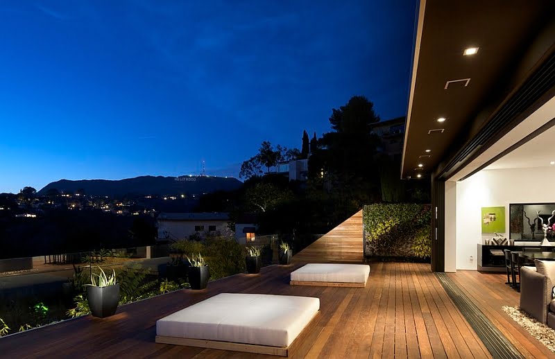 Breathtaking Minimalist Patio with Outdoor Bed Enjoying a Serene Landscape