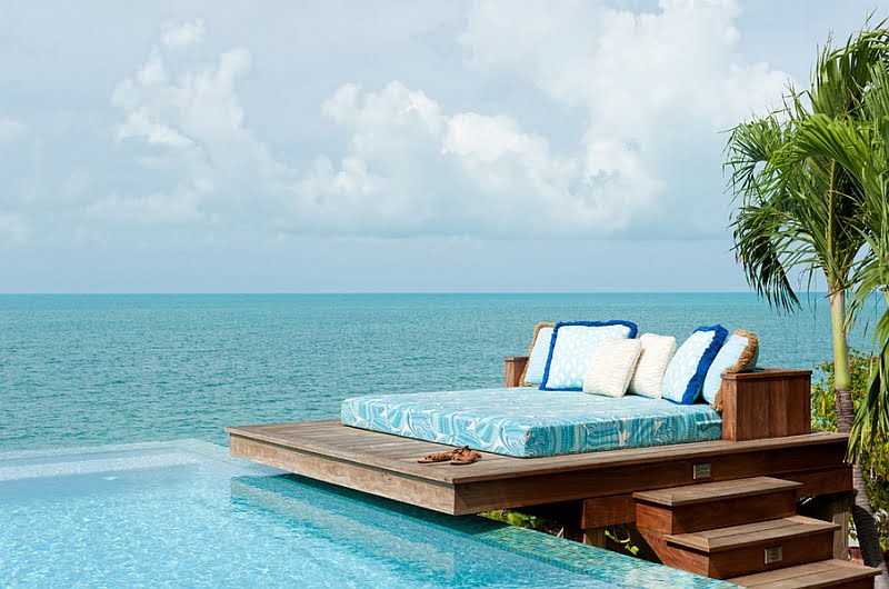 Serene Deck Space Overlooking the Atlantic Ocean with a Impeccable Minimal Outdoor Bed by the Infinity Swimming Pool
