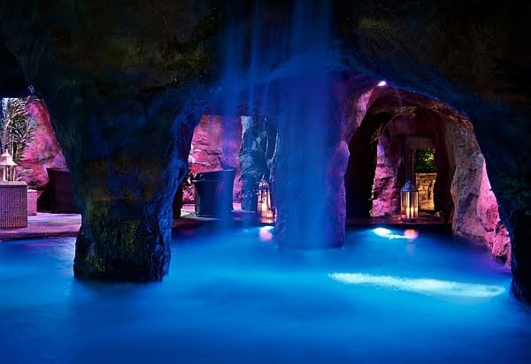 Shattering Indoor Pool with Waterfalls