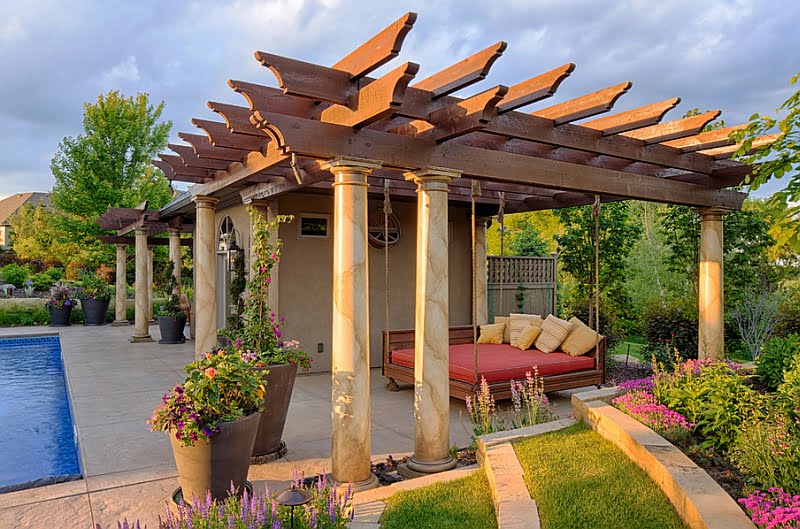 Beautiful Pergola Design Sheltering a Suspended Outdoor Bed by the Swimming Pool