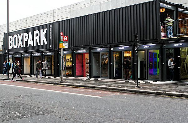 A Mall Realized Out of Containers Wearing Black