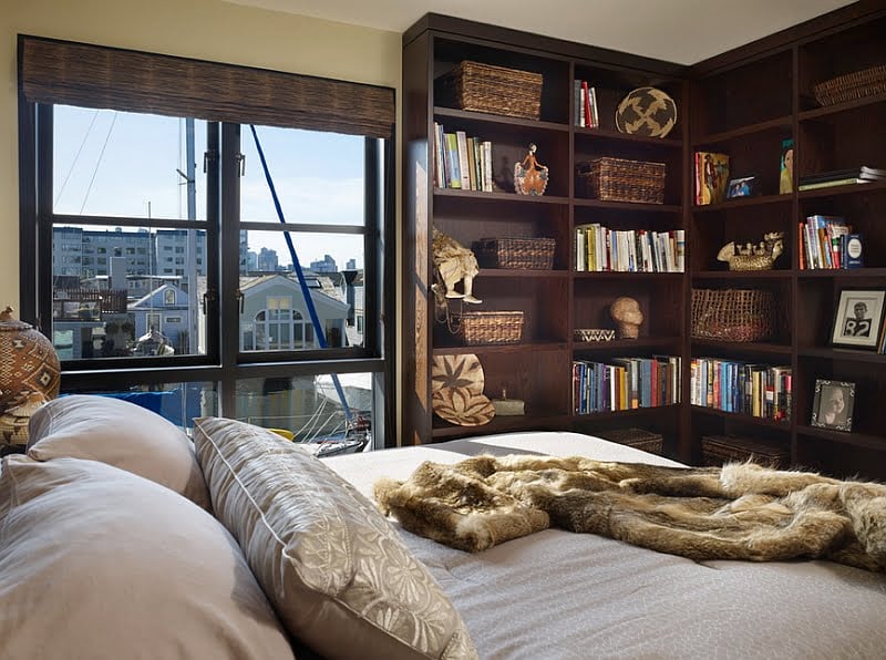 High Corner Bookshelf in the Bedroom Doubling as a Magnificent Display