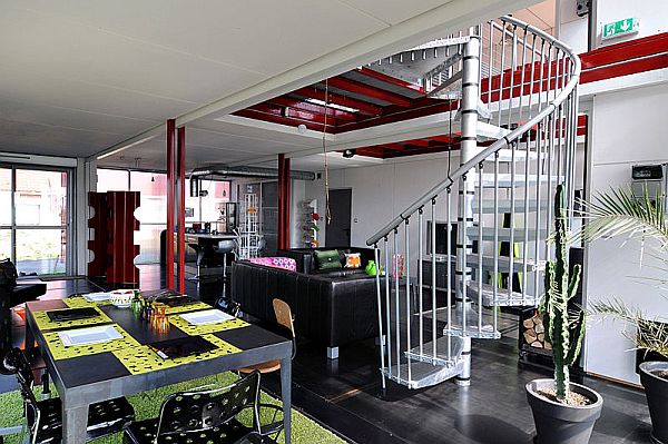 Spiral Staircase Leading to the Top Floor of the Container Home