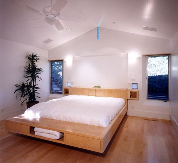 Floating Bed Design With Storage Units Underneath Enhancing The Space