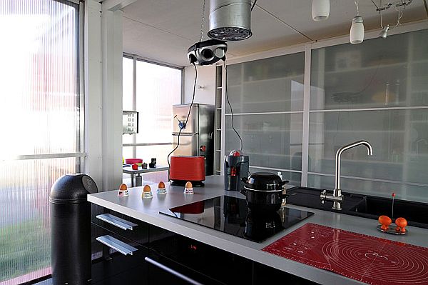Contemporary Kitchen Featuring a Stainless Steel Countertop