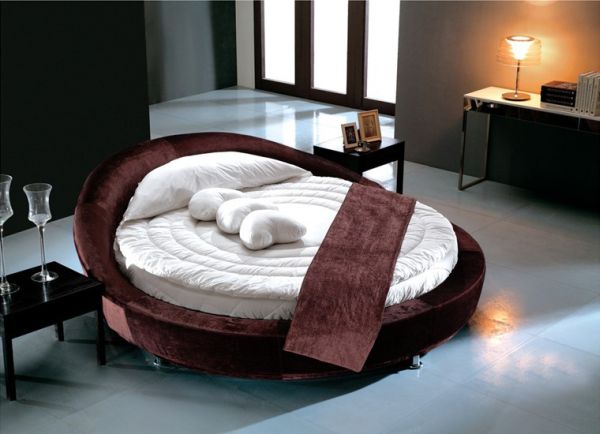 Modern chocolate velvet round bed.
