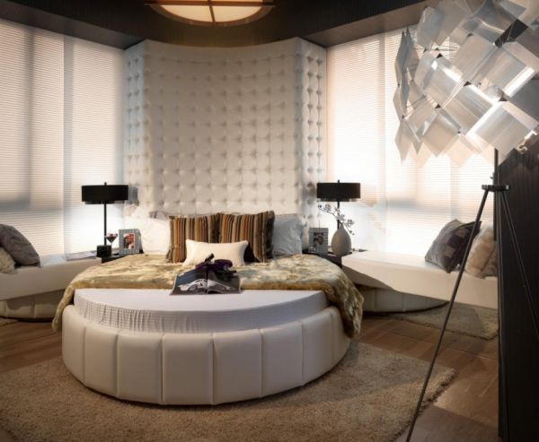 Multi-textured round bed bedroom.