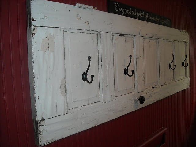 White Door Transformed Into a Coat Rack With a Rustic Scandinavian Look