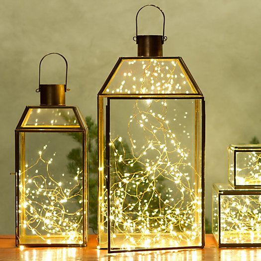 17. Reuse old glass lanterns and add a shimmering light installation