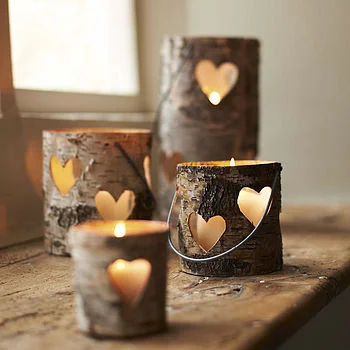 18. Use tree bark as beautiful candle holders