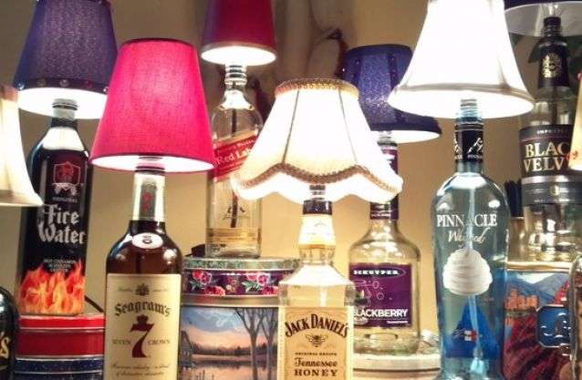 8. Recycle old alcohol bottles into one of a kind lamps