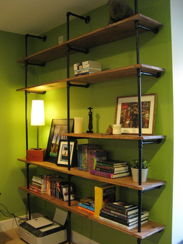 6. Pipes and Wooden Boards Bookshelves