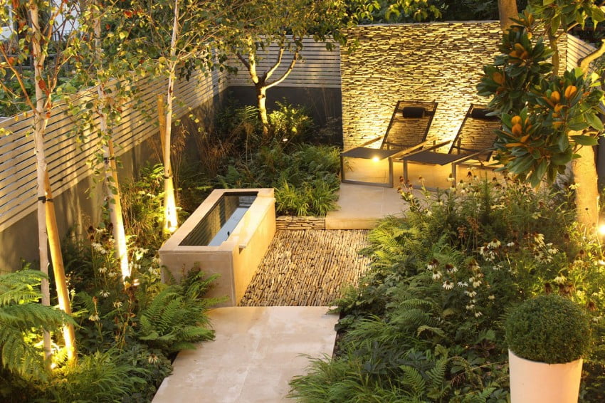 Dense Greenery Complemented by a Rock Texture-Barnsbury Townhouse Garden by Daniel Shea homesthetics (9)