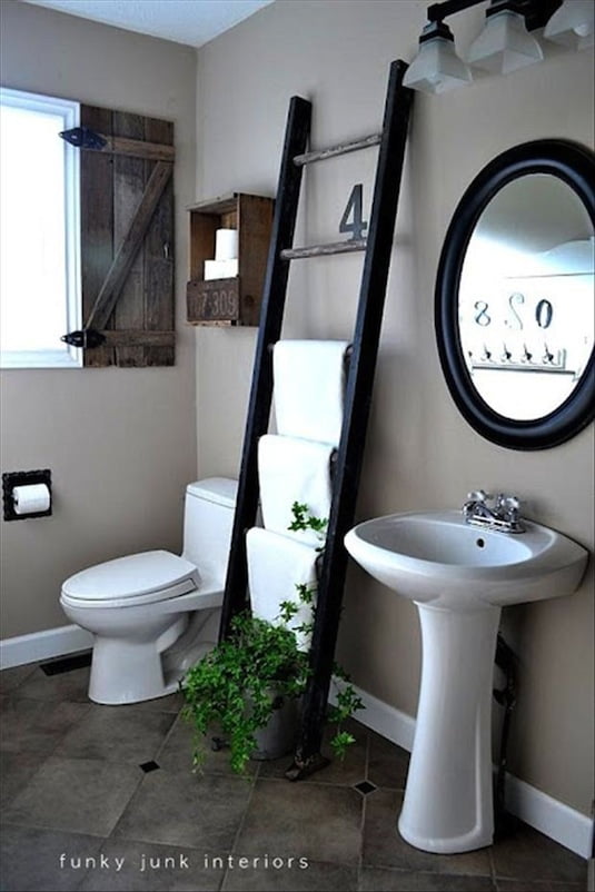 # 13. Rustic Look With a Ladder Towel Rack