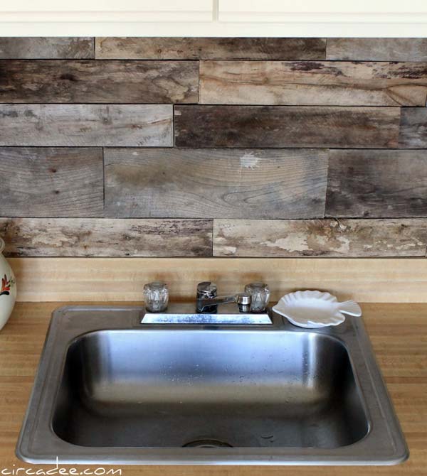 1. Old wooden pallets used in a kitchen backsplash