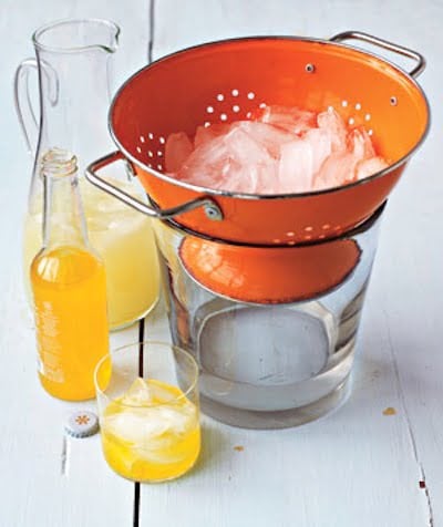 23. USE A COLANDER AS AN ICE BUCKET FOR YOUR PARTIES