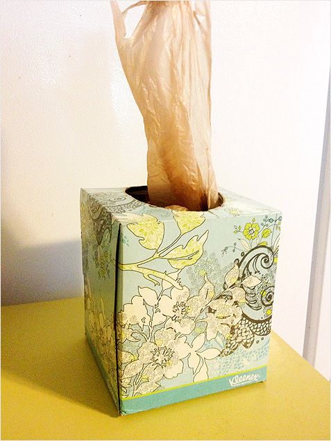 19.USE A TISSUE BOX AS PLASTIC BAG STORAGE